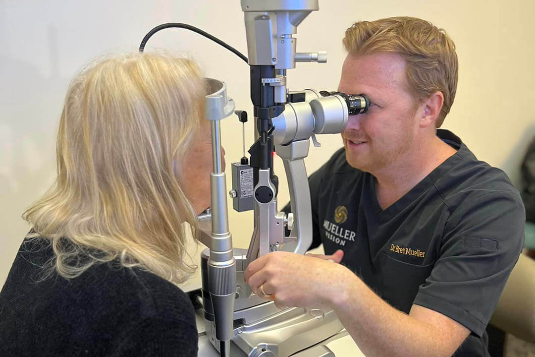 Dr. Mueller Giving an Eye Exam